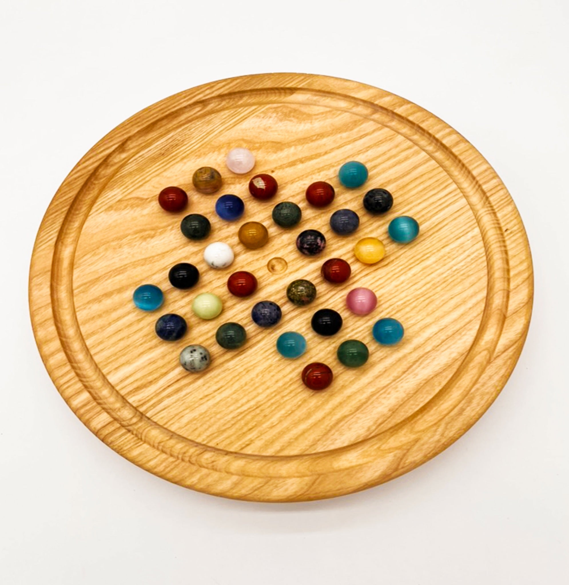 Jeu de solitaire en frêne et chêne avec billes en pierre naturelle